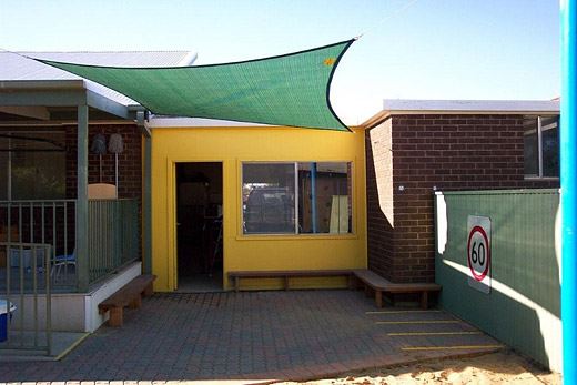 CHILDCARE CENTER BENCH SEATING AND PARKING BAYS