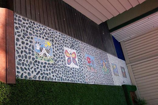 CHILDCARE CENTER PEBBLED PATHWAY WITH INLAID TILES