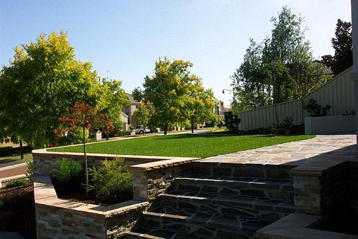 FAMILY PLAYGROUNDS - ARTIFICIAL GRASS AND STONE
